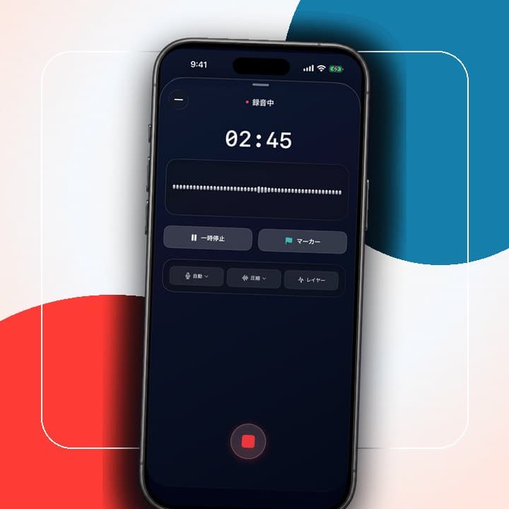 Meja dengan tombol rekam merah dan gelombang audio